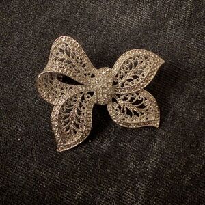 Elegant Silver Bow Brooch